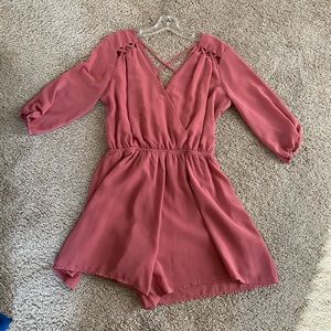 Cute romper with cross cross back Size M
